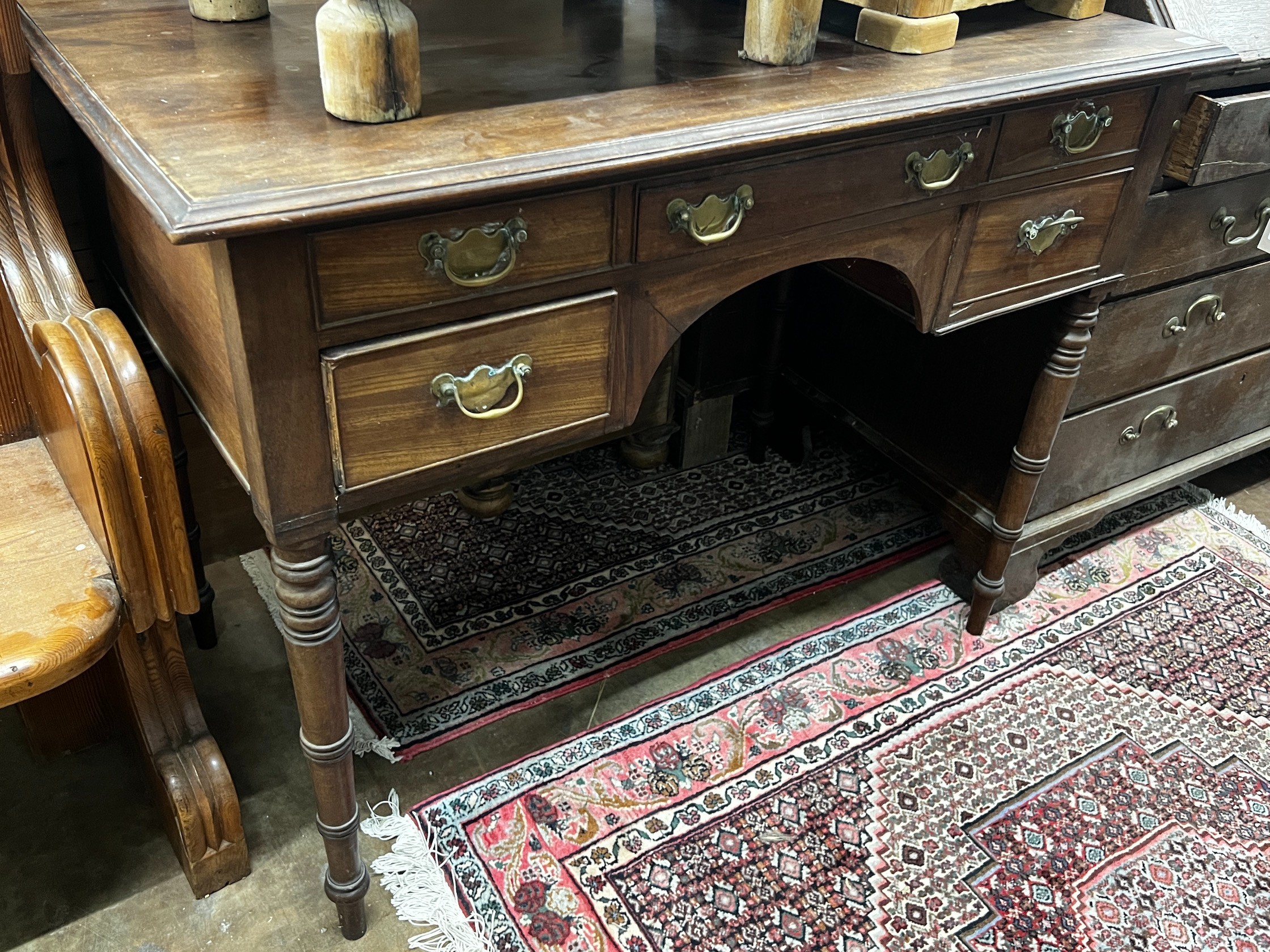 A Regency mahogany kneehole dressing table and a George III banded oak chest of three drawers, width 96cm depth 54cm height 87cm